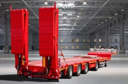 Specialized Heavy-Duty Semi-Trailer with Hydraulic Ramps Tvershmash 993941 Modification 0021