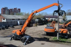 E190WH Wheel Excavator-Loader with Scrap Handling Equipment