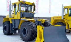 Kirovets K-702MBA-01 Universal Wheel Bulldozer with Blade